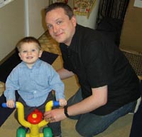 Playing on his tricycle